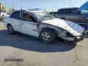 2002 Saturn LS with VIN 1G8JW54R52Y566288, listed as a Copart auction lot 56321595 with Not provided miles and Salvage title. Bid and sale history available at DreamBid. Image 4.