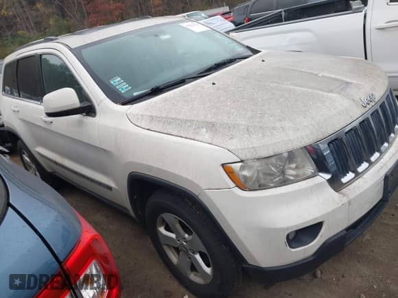 2012 Jeep Grand Cherokee Laredo z VIN 1C4RJFAG2CC248790, wystawiony jako IAAI lot #43563104 z przebiegiem 162 187 mil mil oraz . Historia ofert i sprzedaży dostępna na DreamBid. Obrazek 1.