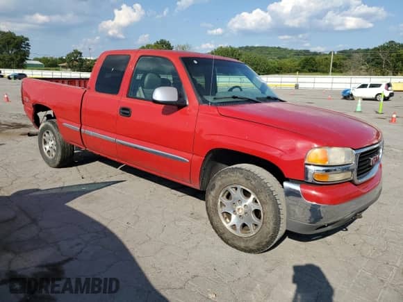 2000 GMC Sierra 1500 SLE with VIN 1GTEK19T2YZ157233, listed as a Copart auction lot 68809595 with 371,111 mi miles and Salvage title. Bid and sale history available at DreamBid. Image 4.