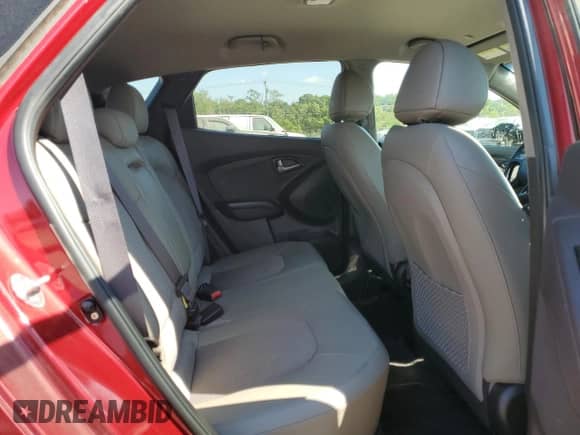 2015 Hyundai Tucson SE z VIN KM8JU3AG5FU010171, wystawiony jako Copart lot #69852325 z przebiegiem 61 024 mil mil oraz Szkoda całkowita • Salvage title. Historia ofert i sprzedaży dostępna na DreamBid. Obrazek 11.