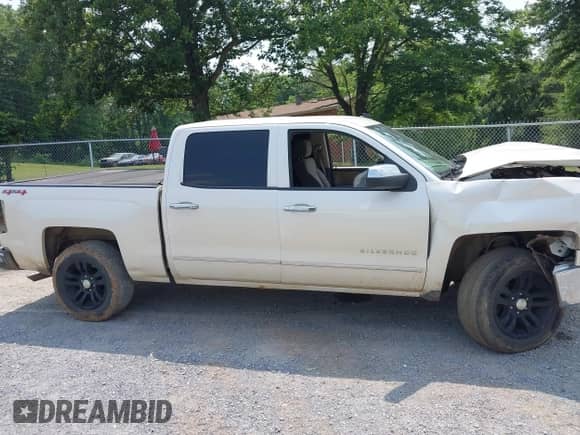 2014 Chevrolet Silverado 1500 LT z VIN 3GCUKREC3EG137228, wystawiony jako IAAI lot #42484505 z przebiegiem 153 954 mil mil oraz . Historia ofert i sprzedaży dostępna na DreamBid. Obrazek 14.