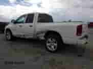 2003 Dodge 1500 ST with VIN 1D7HA18N63S176054, listed as a Copart auction lot 85005405 with 154,608 mi miles and Salvage title. Bid and sale history available at DreamBid. Image 2.