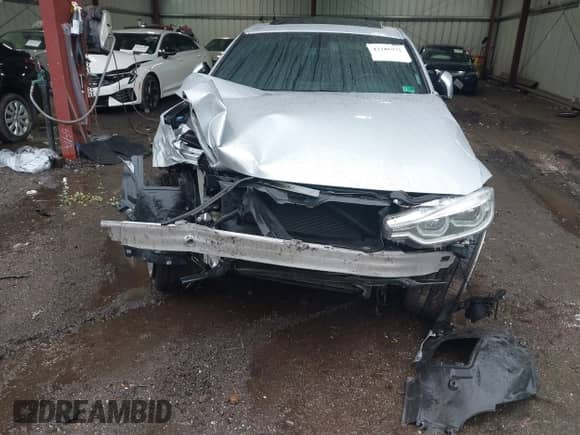 2018 BMW 3 Series 330i xDrive with VIN WBA8D9G52JNU70237, listed as a IAAI auction lot 43186572 with 102,985 mi miles and . Bid and sale history available at DreamBid. Image 6.