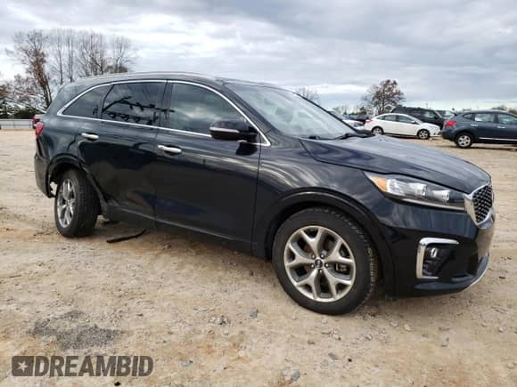 2020 Kia Sorento SX с VIN 5XYPK4A59LG670221, выставлен на аукционе Copart как лот 85453054 с пробегом 52 771 миль миль и Списание • Salvage title. История ставок и продаж доступна на DreamBid. Изображение 4.