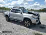 2017 Toyota Tacoma TRD Sport with VIN 5TFAZ5CN5HX030287, listed as a Copart auction lot 84213985 with 112,672 mi miles and Salvage title. Bid and sale history available at DreamBid. Image 4.