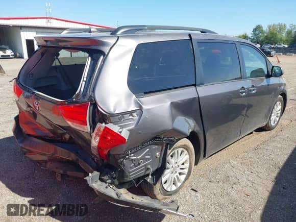 2013 Toyota Sienna XLE AAS with VIN 5TDYK3DC4DS322629, listed as a IAAI auction lot 43330507 with 158,626 mi miles and . Bid and sale history available at DreamBid. Image 4.