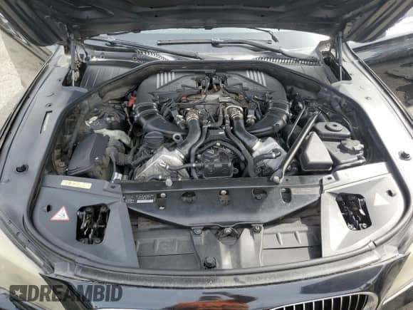 2009 BMW 7 Series 750i z VIN WBAKA83559CY33667, wystawiony jako Copart lot #47262285 z przebiegiem 111 879 mil mil oraz Czysty tytuł • Clean title. Historia ofert i sprzedaży dostępna na DreamBid. Obrazek 11.