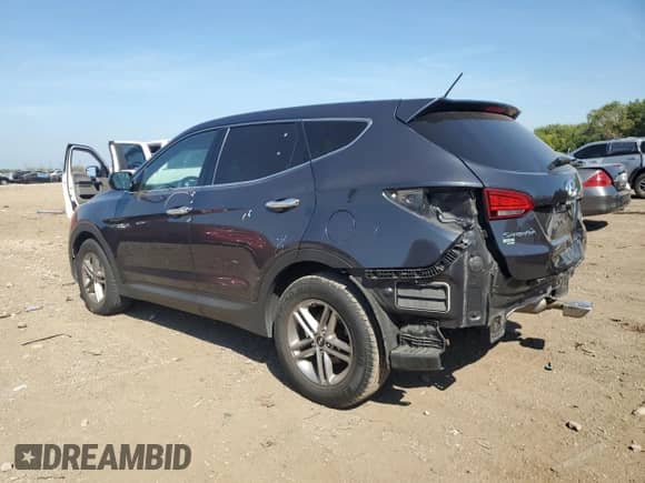 2018 Hyundai Santa Fe 2.4L с VIN 5XYZTDLB8JG572559, выставлен на аукционе Copart как лот 80887585 с пробегом 69 997 миль миль и Списание • Salvage title. История ставок и продаж доступна на DreamBid. Изображение 2.
