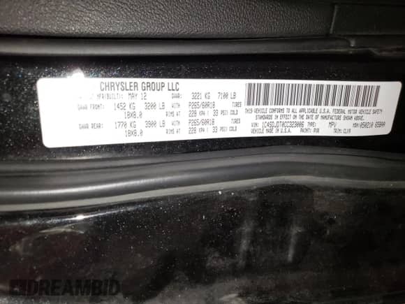 2012 Dodge Durango Crew with VIN 1C4SDJDT0CC323006, listed as a Copart auction lot 63631985 with 126,521 mi miles and Salvage title. Bid and sale history available at DreamBid. Image 13.