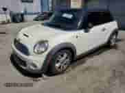 2013 MINI Hardtop with VIN WMWSU3C52DT680782, listed as a Copart auction lot 61779515 with 94,378 mi miles and Salvage title. Bid and sale history available at DreamBid. Image 1.