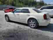 2005 Chrysler 300 300C AWD with VIN 2C3JK63HX5H647421, listed as a Copart auction lot 81134595 with 179,457 mi miles and Salvage title. Bid and sale history available at DreamBid. Image 2.