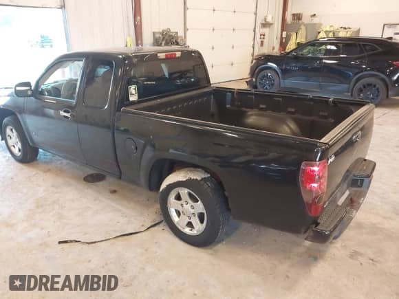2009 Chevrolet Colorado Work Truck with VIN 1GCCS19E398127383, listed as a IAAI auction lot 43310054 with 129,208 mi miles and . Bid and sale history available at DreamBid. Image 3.