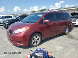 2015 Toyota Sienna LE with VIN 5TDKK3DC9FS604841, listed as a Copart auction lot 67405645 with 148,851 mi miles and Salvage title. Bid and sale history available at DreamBid. Image 1.