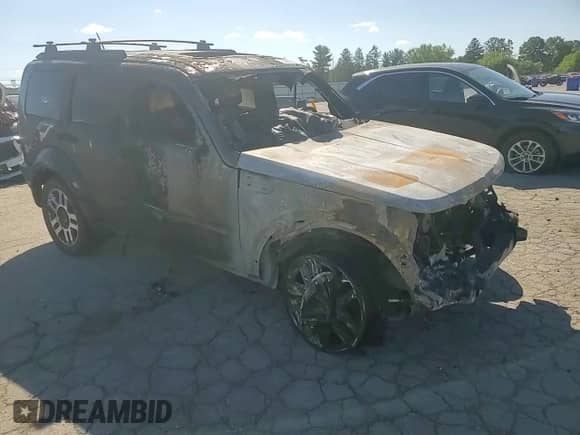 2011 Dodge Nitro Heat with VIN 1D4PU4GK4BW570796, listed as a Copart auction lot 70407245 with Not provided miles and Salvage title. Bid and sale history available at DreamBid. Image 14.