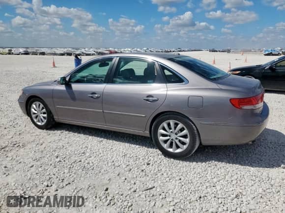 2007 Hyundai Azera SE with VIN KMHFC46F07A213549, listed as a Copart auction lot 81397785 with 203,460 mi miles and Salvage title. Bid and sale history available at DreamBid. Image 2.