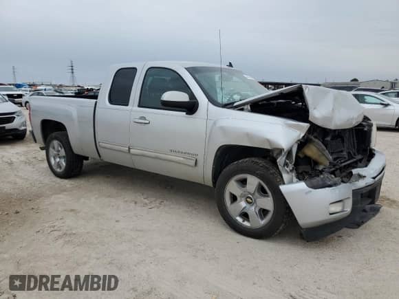 2010 Chevrolet Silverado 1500 LTZ with VIN 1GCSCTE06AZ202767, listed as a Copart auction lot 46430905 with 209,519 mi miles and Salvage title. Bid and sale history available at DreamBid. Image 4.