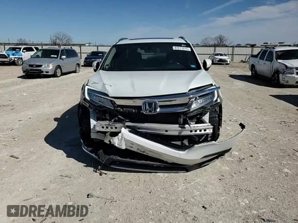 2020 Honda Pilot Touring 7-Passenger z VIN 5FNYF5H67LB021988, wystawiony jako Copart lot #47211215 z przebiegiem 99 698 mil mil oraz Szkoda całkowita • Salvage title. Historia ofert i sprzedaży dostępna na DreamBid. Obrazek 12.