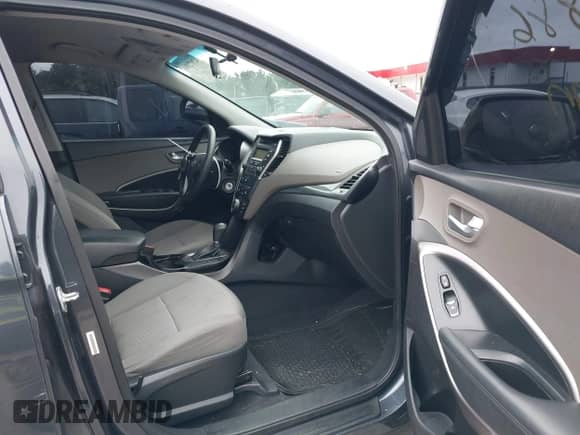 2015 Hyundai Santa Fe z VIN 5XYZTDLB8FG261026, wystawiony jako IAAI lot #42872886 z przebiegiem 146 244 mil mil oraz . Historia ofert i sprzedaży dostępna na DreamBid. Obrazek 5.