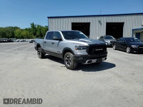2022 Ram 1500 Rebel z VIN 1C6SRFLM6NN179582, wystawiony jako Copart lot #68950375 z przebiegiem 105 432 mil mil oraz Szkoda całkowita • Salvage title. Historia ofert i sprzedaży dostępna na DreamBid. Obrazek 14.