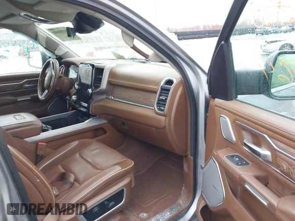 2022 Ram 1500 Longhorn z VIN 1C6SRFKT8NN192598, wystawiony jako IAAI lot #41645164 z przebiegiem 48 890 mil mil oraz . Historia ofert i sprzedaży dostępna na DreamBid. Obrazek 5.