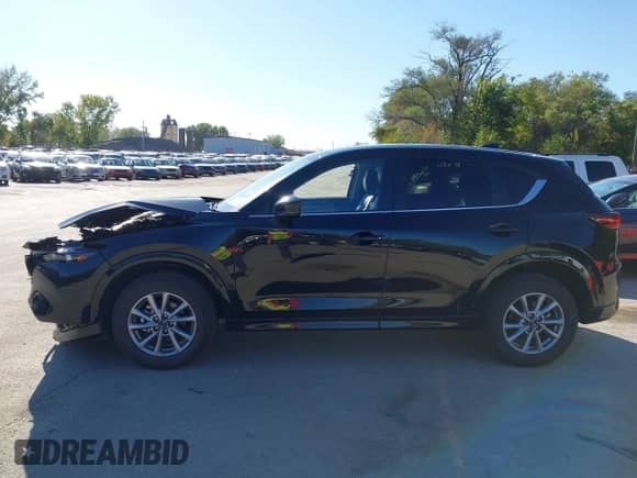 2025 Mazda CX-5 S Select z VIN JM3KFBBLXS0589143, wystawiony jako IAAI lot #43401475 z przebiegiem 24 004 mil mil oraz . Historia ofert i sprzedaży dostępna na DreamBid. Obrazek 14.
