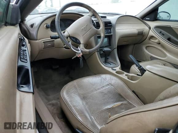 2004 Ford Mustang Deluxe с VIN 1FAFP44454F123067, выставлен на аукционе Copart как лот 86784474 с пробегом 161 541 миль миль и Списание • Salvage title. История ставок и продаж доступна на DreamBid. Изображение 8.