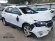 2018 Chevrolet Equinox LT with VIN 2GNAXKEX5J6158772, listed as a IAAI auction lot 43394872 with 102,480 mi miles and . Bid and sale history available at DreamBid. Image 14.