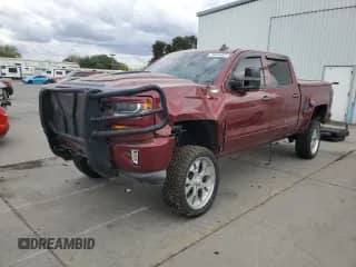 2016 Chevrolet Silverado 1500 LT z VIN 3GCUKREC0GG339978, wystawiony jako Copart lot #84646325 z przebiegiem 37 875 mil mil oraz Czysty tytuł • Clean title. Historia ofert i sprzedaży dostępna na DreamBid. Obrazek 1.