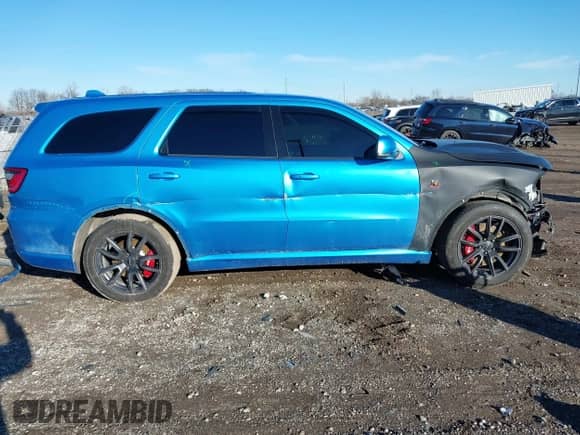 2018 Dodge Durango SRT with VIN 1C4SDJGJ1JC415720, listed as a IAAI auction lot 41193674 with 63,140 mi miles and . Bid and sale history available at DreamBid. Image 14.