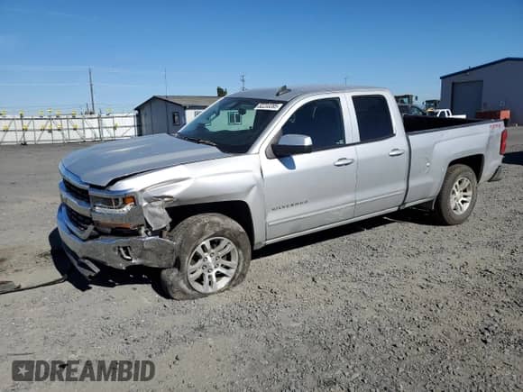 2017 Chevrolet Silverado 1500 LT with VIN 1GCVKREC9HZ210532, listed as a Copart auction lot 82233285 with 125,789 mi miles and Salvage title. Bid and sale history available at DreamBid. Image 1.