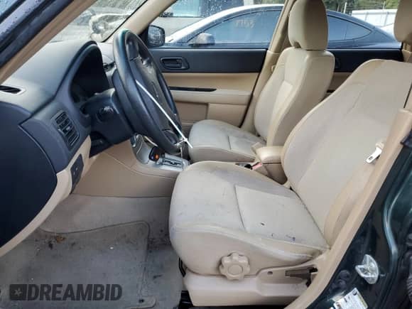 2004 Subaru Forester X with VIN JF1SG63694H724743, listed as a Copart auction lot 87098815 with 120,127 mi miles and Salvage title. Bid and sale history available at DreamBid. Image 7.