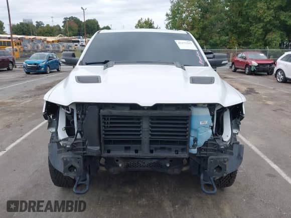 2019 Ram 1500 Rebel z VIN 1C6SRFLT2KN534007, wystawiony jako IAAI lot #43375553 z przebiegiem 113 737 mil mil oraz . Historia ofert i sprzedaży dostępna na DreamBid. Obrazek 13.