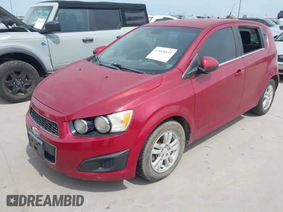 2012 Chevrolet Sonic LT z VIN 1G1JC6SB2C4213759, wystawiony jako IAAI lot #43028832 z przebiegiem 90 033 mil mil oraz . Historia ofert i sprzedaży dostępna na DreamBid. Obrazek 2.