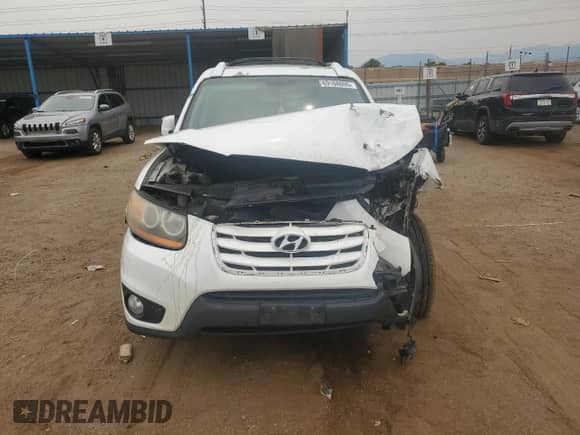 2011 Hyundai Santa Fe SE с VIN 5XYZHDAG2BG063651, выставлен на аукционе Copart как лот 69108095 с пробегом Не указан миль и Списание • Salvage title. История ставок и продаж доступна на DreamBid. Изображение 5.