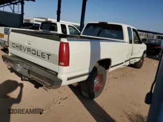 1994 Chevrolet Silverado 2500 с VIN 1GCGC29N0RE198403, выставлен на аукционе Copart как лот 74313284 с пробегом 216 190 миль миль и Списание • Salvage title. История ставок и продаж доступна на DreamBid. Изображение 3.