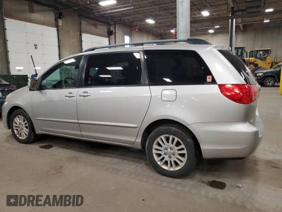 2010 Toyota Sienna XLE с VIN 5TDYK4CC1AS311946, выставлен на аукционе Copart как лот 86078525 с пробегом 193 862 миль миль и Списание • Salvage title. История ставок и продаж доступна на DreamBid. Изображение 2.