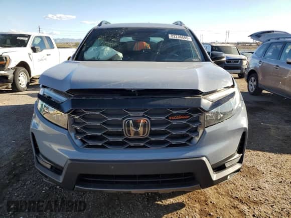 2022 Honda Passport TrailSport with VIN 5FNYF8H64NB025971, listed as a Copart auction lot 82236885 with 28,874 mi miles and Salvage title. Bid and sale history available at DreamBid. Image 5.