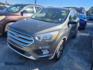 2018 Ford Escape SE with VIN 1FMCU9GD5JUD47165, listed as a IAAI auction lot 43520991 with 114,793 mi miles and . Bid and sale history available at DreamBid. Image 2.