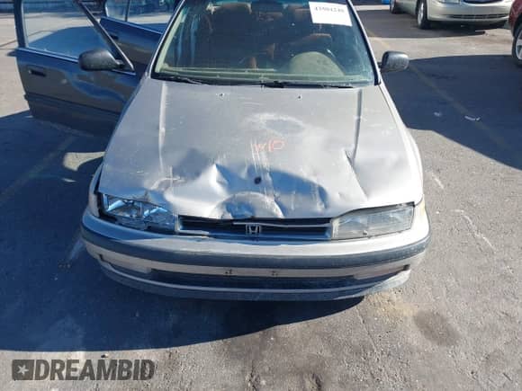 1991 Honda Accord EX z VIN JHMCB756XMC801180, wystawiony jako IAAI lot #43504248 z przebiegiem 268 067 mil mil oraz . Historia ofert i sprzedaży dostępna na DreamBid. Obrazek 6.