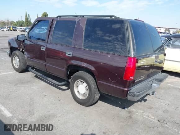 1997 Chevrolet Tahoe z VIN 1GNEC13RXVJ305186, wystawiony jako IAAI lot #41687258 z przebiegiem 247 634 mil mil oraz . Historia ofert i sprzedaży dostępna na DreamBid. Obrazek 3.