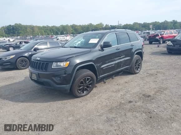 2016 Jeep Grand Cherokee Laredo with VIN 1C4RJFAG3GC396047, listed as a IAAI auction lot 43297273 with 160,023 mi miles and . Bid and sale history available at DreamBid. Image 2.