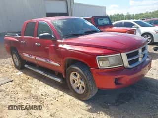 2009 Dodge Dakota SXT with VIN 1D7HE38K49S778966, listed as a IAAI auction lot 42034664 with 169,756 mi miles and . Bid and sale history available at DreamBid. Image 1.