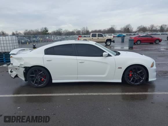2013 Dodge Charger SRT-8 z VIN 2C3CDXEJXDH675646, wystawiony jako IAAI lot #41464139 z przebiegiem 105 583 mil mil oraz . Historia ofert i sprzedaży dostępna na DreamBid. Obrazek 13.