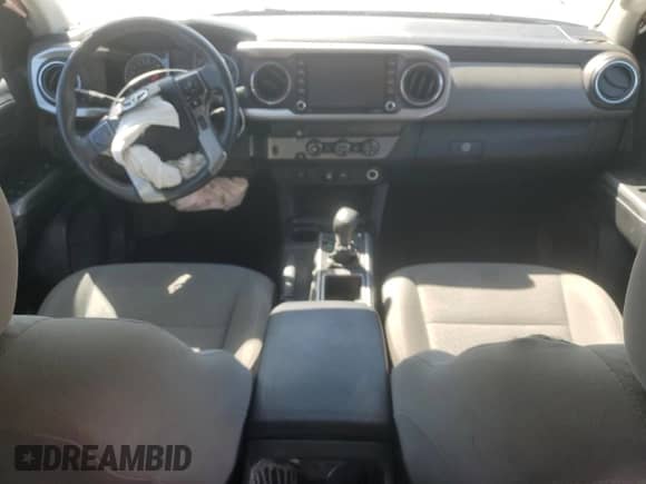2020 Toyota Tacoma SR5 с VIN 3TMAZ5CN0LM120428, выставлен на аукционе Copart как лот 69748535 с пробегом 147 306 миль миль и Списание • Salvage title. История ставок и продаж доступна на DreamBid. Изображение 8.