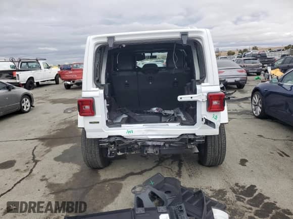 2021 Jeep Wrangler Unlimited Sahara High Altitude with VIN 1C4HJXEM2MW539162, listed as a Copart auction lot 81985614 with Not provided miles and Salvage title. Bid and sale history available at DreamBid. Image 6.