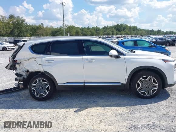 2023 Hyundai Santa Fe Limited with VIN 5NMS44AL0PH633816, listed as a IAAI auction lot 43324554 with 31,271 mi miles and . Bid and sale history available at DreamBid. Image 13.