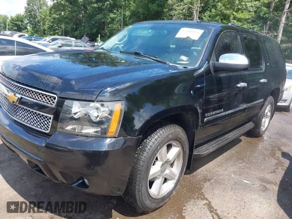 2009 Chevrolet Suburban LTZ z VIN 1GNFK36369R300973, wystawiony jako IAAI lot #42766933 z przebiegiem 184 365 mil mil oraz . Historia ofert i sprzedaży dostępna na DreamBid. Obrazek 2.