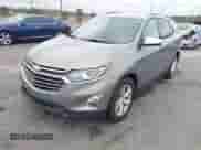 2018 Chevrolet Equinox Premier with VIN 3GNAXMEV7JS547991, listed as a IAAI auction lot 41208640 with 98,879 mi miles and . Bid and sale history available at DreamBid. Image 2.