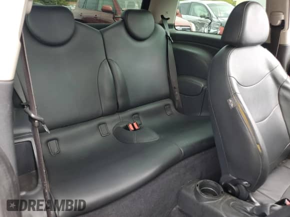 2006 MINI Hardtop with VIN WMWRC33526TK66647, listed as a Copart auction lot 81100025 with 179,203 mi miles and Salvage title. Bid and sale history available at DreamBid. Image 10.