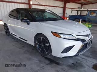 2018 Toyota Camry XSE z VIN 4T1B61HK1JU003112, wystawiony jako IAAI lot #43486729 z przebiegiem 220 861 mil mil oraz . Historia ofert i sprzedaży dostępna na DreamBid. Obrazek 1.